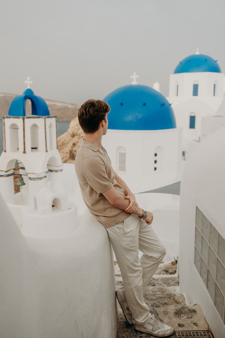 Looking out over Santorini's blue-domed churches in Oia